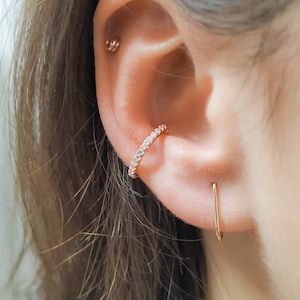 Orecchino a polsino in oro rosa-Orecchino a polsino con zirconi cubici-Orecchino a polsino in oro rosa-Orecchino a clip in oro rosa senza piercing-Orecchino a conchiglia-Conchiglia finta