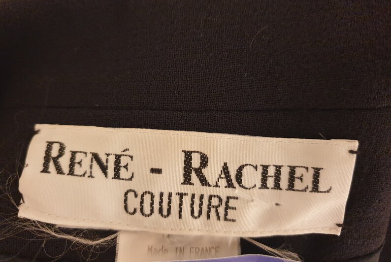 May include: White label with black text that reads "RENE - RACHEL COUTURE" and "Made in France".