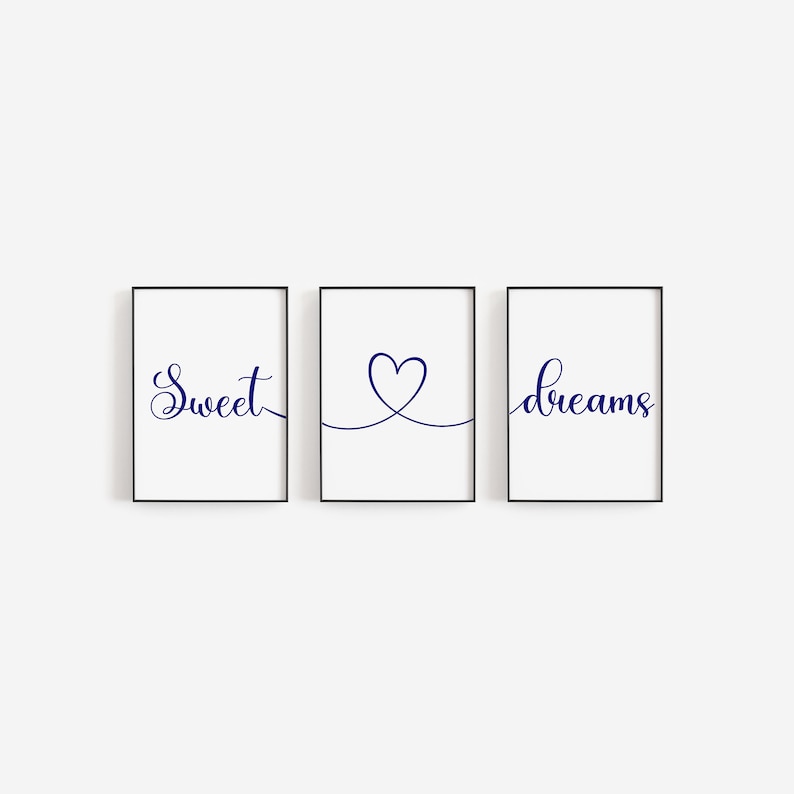 May include: Three framed prints with the words "Sweet", a heart shape, and "dreams" in navy blue cursive font.