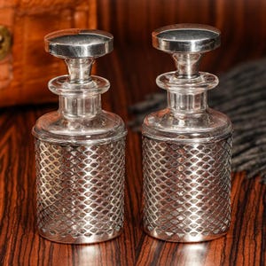 Sophisticated Pair Antique Crystal Perfume Scent Cologne Bottles Sterling Silver Grillwork Sleeves Home Decor