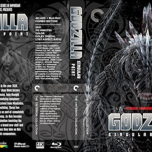 May include: A black and white DVD cover for the film Godzilla Singular Point. The cover features a close-up of Godzilla's face, with the title of the film in large, white letters. The cover also includes the text "The Criterion Collection" and "Netflix".