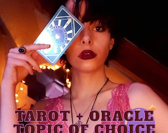 May include: A rectangular tarot card with a blue and gold geometric design held up to cover one eye. The card features a central heart emblem. The text TAROT + ORACLE TOPIC OF CHOICE is overlaid in dark purple letters at the bottom of the image.