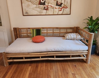 Handmade Bamboo Daybed, a sanctuary of tranquility created with skilled craftsmanship. Crafted from sustainable bamboo.