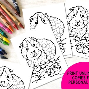 May include: Black and white printable coloring page featuring a guinea pig with a dotted body. The guinea pig is sitting on a bed of grass with two strawberries. The text "PRINT UNLIMITED COPIES FOR PERSONAL USE!" is in pink text on a white background.