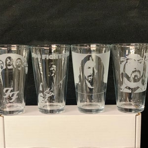 Set of 4 etched glasses.  Foo Fighters Dave Grohl Taylor Hawkins