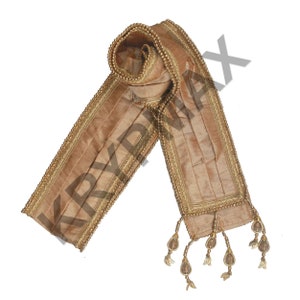 May include: A long, brown fabric sash with gold trim and beaded tassels. The sash is folded in half and the tassels are hanging down.