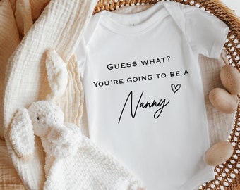 Guess What? You're Going To Be A Nanny with Heart Baby Announcement Vest (Pregnancy Reveal | New Nanny | Nan To Be | Mum Promoted to Nan)