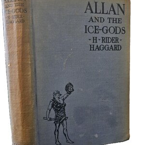 May include: A vintage hardcover book titled "Allan and the Ice-Gods" by H. Rider Haggard. The book cover features a black and white illustration of a man holding a severed head.