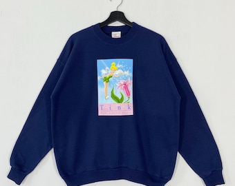 Bluza z okrągłym dekoltem w stylu vintage z lat 90. z Dzwoneczkiem i wróżkami z srebrną mgłą, z nadrukiem logo Piotrusia Pana, niebieska, rozmiar M