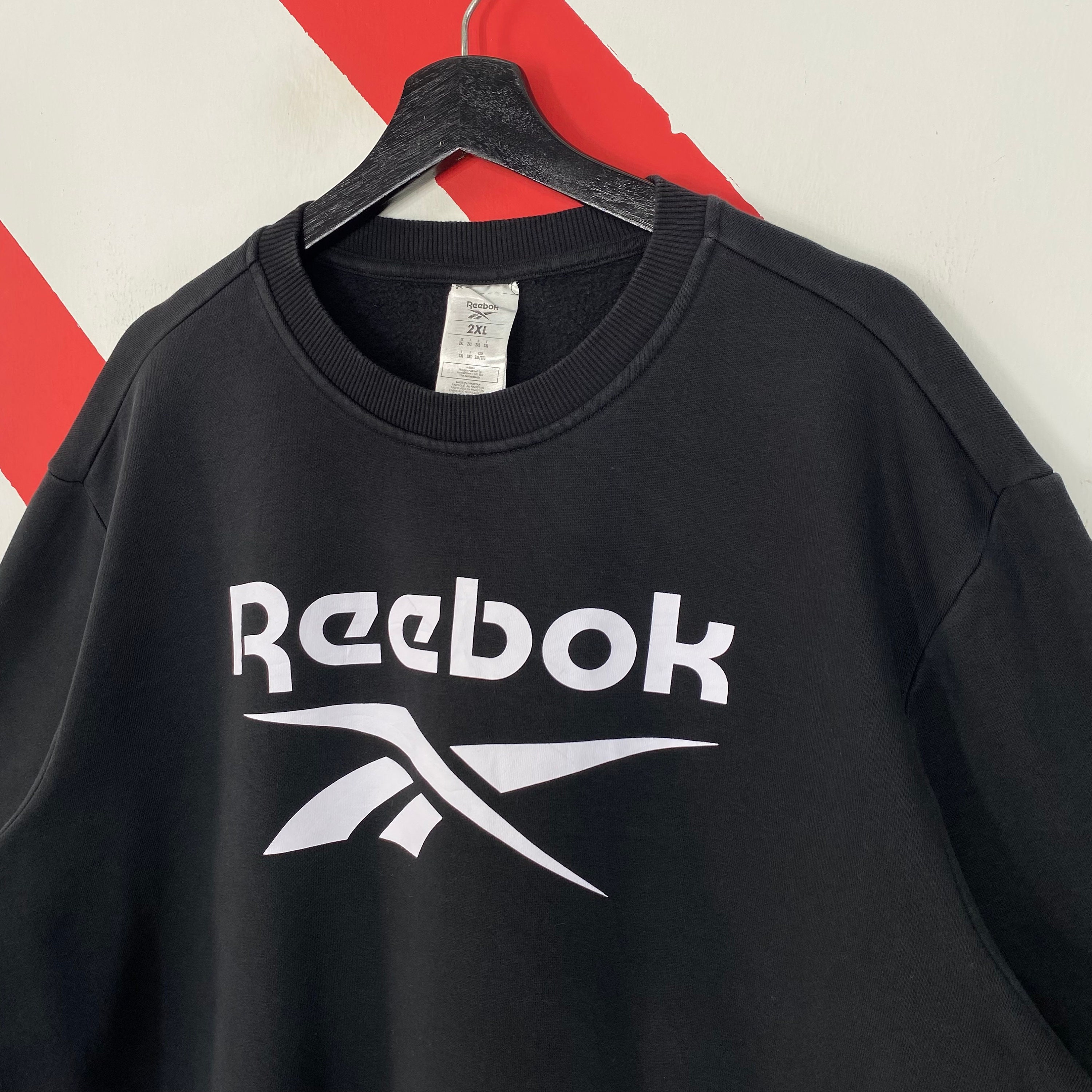 Reebok black sweatshirt sales