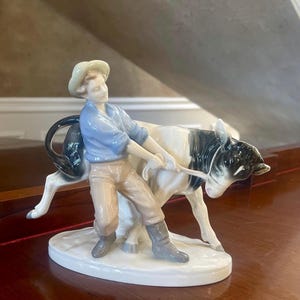 GDR Porcelain Man With Cow Figurine