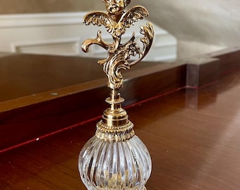 Botella de perfume de latón y vidrio con forma de querubín de estilo vintage