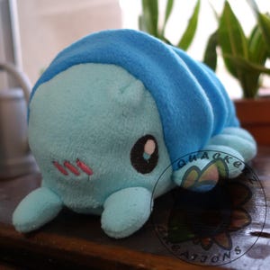 Assortiment de peluches isopodes et larves