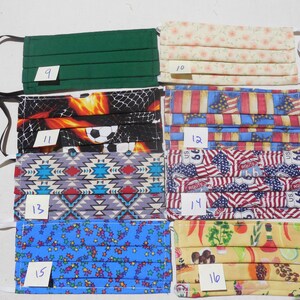 May include: A collection of 10 fabric face masks with various patterns, including green, floral, soccer, American flag, and southwestern designs. The masks are numbered 9 through 16.