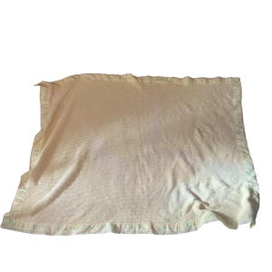 pale yellow vintage baby blanket