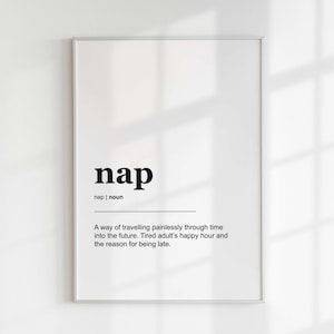 May include: A black and white printable wall art print with the word "nap" defined as "A way of travelling painlessly through time into the future. Tired adult's happy hour and the reason for being late."