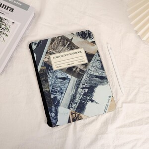 May include: A black and white composition notebook cover featuring a collage of vintage photographs of a city. The cover has the text "COMPOSITION NOTEBOOK" and "110 pages" printed on it.
