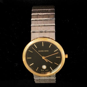 Daniel Mink 1900 collection wrist watch with 18 carat gold bezel and steel case and links image 2