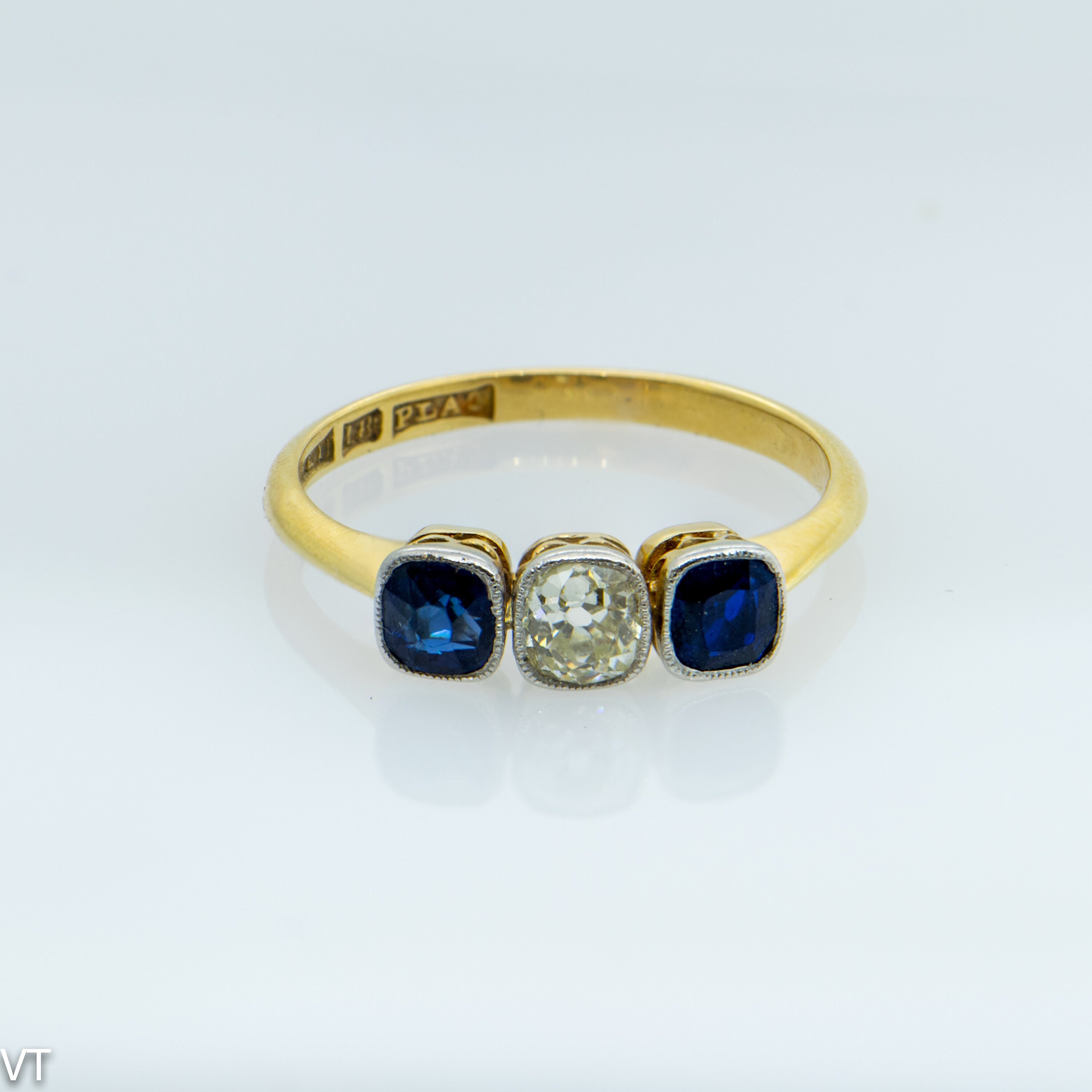 Art nouveau gold  ring with  cushion cut Diamond and  two  cushion cut Australian Sapphires
