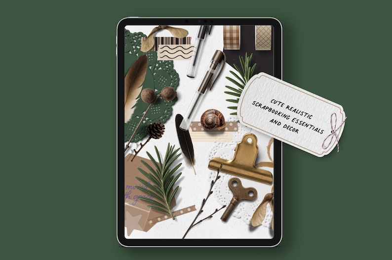 May include: A digital tablet displays a collection of scrapbooking essentials and decor. The arrangement includes a pen, feathers, a snail shell, a gold-coloured clip, a key, and a tag that reads "CUTE REALISTIC SCRAPBOOKING ESSENTIALS AND DECOR."