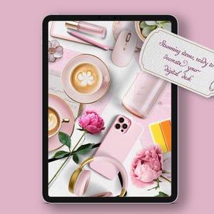 May include: A digital tablet screen displaying a pink and gold aesthetic with a phone, coffee cups, flowers, and headphones. The text on the screen reads "Stunning items, ready to decorate your digital desk."