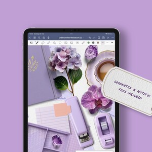 May include: A digital tablet displays a flat lay of stationery and floral elements in shades of purple. Items include a notebook, stapler, tape dispenser, and a tag that reads "GOODNOTES & NOTEFUL FILES INCLUDED".