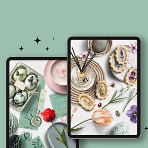 May include: Two digital tablets displaying images of spring-themed decorations. One tablet shows a close-up of decorated Easter eggs in a carton, while the other shows cookies with pressed flowers and a floral arrangement.