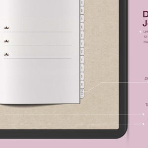 May include: Digital journal on a tablet screen. The open journal pages are white with lines and decorative elements. The right side of the screen displays the words "Digital Journal" and other text. The background is a light tan color.
