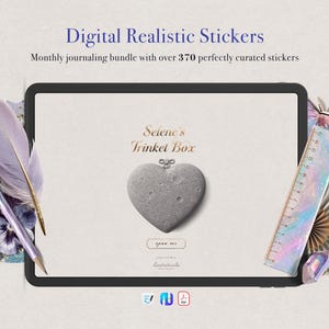 Könnte beinhalten: Ein digitales Tablet mit dem Text Digital Realistic Stickers, Monthly journaling bundle with over 370 perfectly curated stickers, Selene's Trinket Box und open me. Der Bildschirm zeigt ein graues herzförmiges Objekt mit kraterartiger Textur.