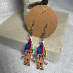 Whimsical and Colorful Troll Doll Dangle Earrings. Perfect for any vintage or chic outfit and fantastic for a gift.