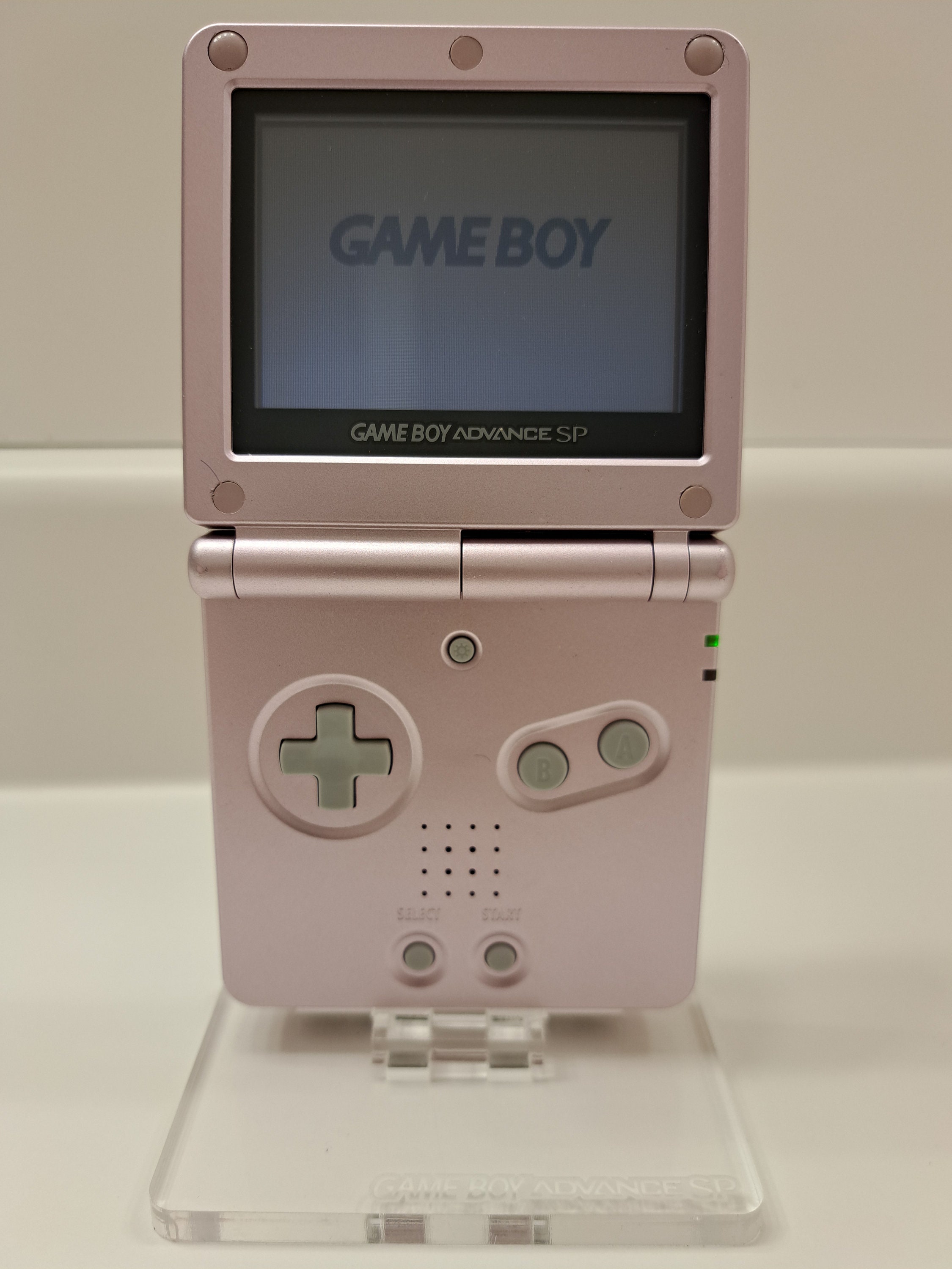 Japan Nintendo Gameboy Advance Sp Game boy Pearl Pink Used Good Condition,  All Genuine OEM parts, Region Free. Comes w/ new generic charger