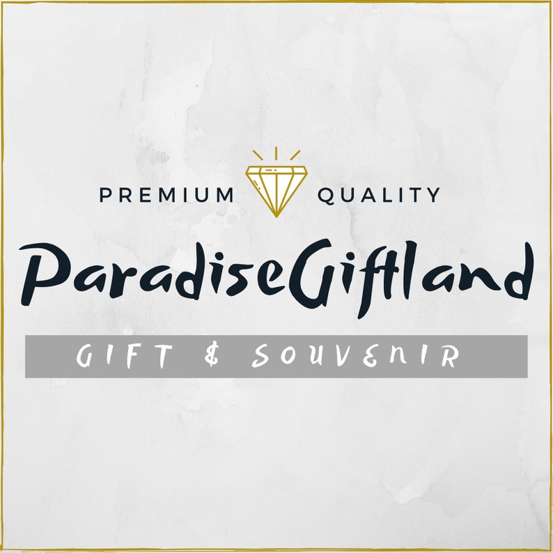 May include: A logo for a gift shop called "Paradise Giftland" with the words "Premium Quality" and "Gift & Souvenir" below the logo. The logo features a diamond with a gold outline and a gold star above it.