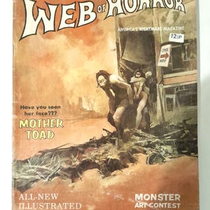 Puede incluir: Portada vintage de la revista "Web of Horror". La portada presenta una ilustración en tonos sepia de un monstruo y una mujer. El texto incluye "America's Nightmare Magazine", "Mother Toad" y "Monster Art Contest".