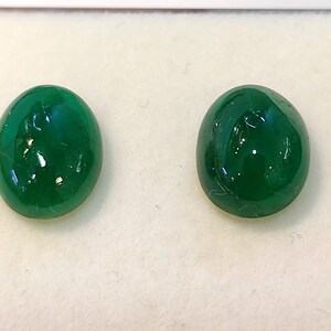 Natural Zambia Emerald cabochon pair (1.40 carats) oval cut, good quality
