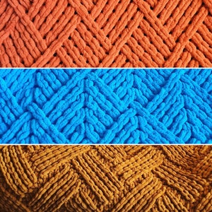 May include: Three different colors of chunky knit fabric in a chevron pattern. The top section is a burnt orange color, the middle section is a bright blue, and the bottom section is a mustard yellow.