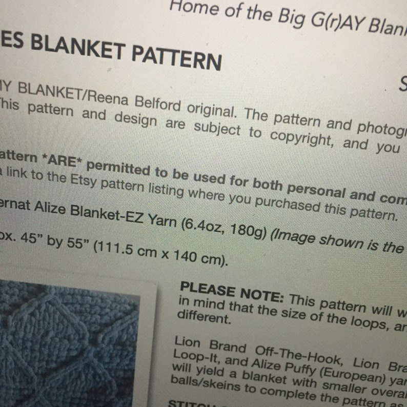 May include: A close-up of a crochet blanket pattern with instructions for making a blanket using Alize Blanket-EZ yarn. The pattern is 45 inches by 55 inches (111.5 cm x 140 cm).