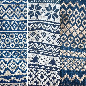 May include: Three different knitted fabric swatches in a blue and white color scheme. The swatches feature different geometric patterns.
