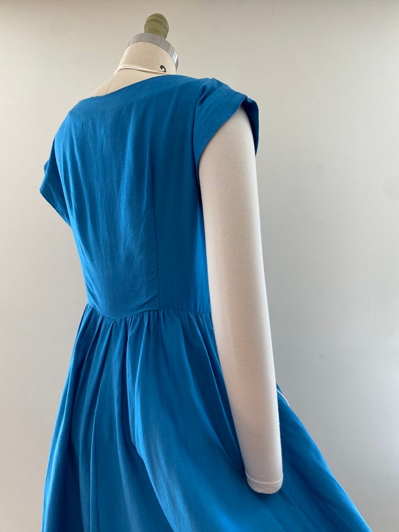 1950s blue appliqué swirl dress - image 4