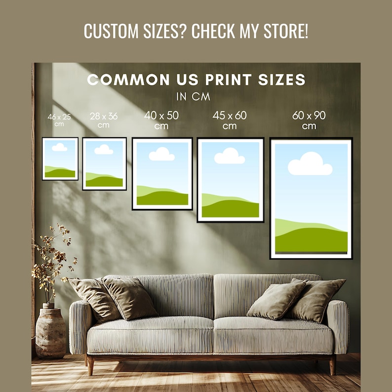 May include: Five framed landscape prints with black borders, depicting a blue sky, white clouds, and green hills. The prints are displayed above a sofa. Text reads: "CUSTOM SIZES? CHECK MY STORE! COMMON US PRINT SIZES IN CM".