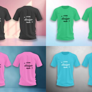 K&ouml;nnte beinhalten: Acht T-Shirts in verschiedenen Farben, darunter Schwarz, Gr&uuml;n, Pink und Blau. Jedes T-Shirt tr&auml;gt den Aufdruck "YOUR design HERE." auf der Vorderseite.