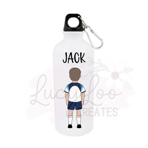 May include: White water bottle with a black lid and a carabiner clip. The bottle has a cartoon illustration of a boy wearing a soccer uniform and the name "JACK" printed on the front.