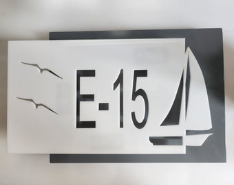 Modern Home Identification number decor with personalized design.