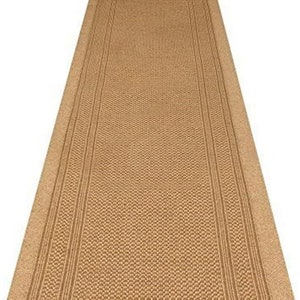 May include: A brown and beige runner rug with a textured woven design. The rug has two stripes running down the centre.