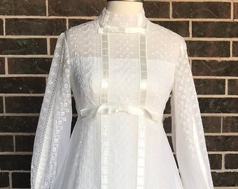 Vintage Regency Style Embroidered Long Sleeve Wedding Gown with Empire Waist and Mock Neckline