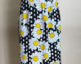 Jupe longue en polyester à fleurs jaune, blanche et noire vintage