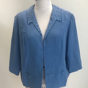 Chaqueta corta vintage azul claro con mangas 3/4