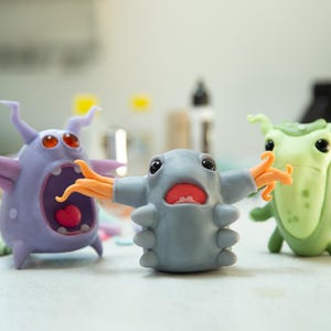 Family Bacteria figurine in anime style, cool original character and weird cartoon art doll creature