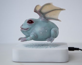 Levitating frog sculpture with dragon wings weird and magic frog doll figurine with levitation pot dragon toad kinetic sculpture magic stuff