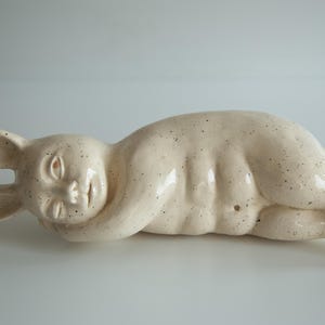 Ware Rabbit, ceramic sculpture of sleeping Bunny with open eye, cute and weird original art work, best unusual easter gift or decor