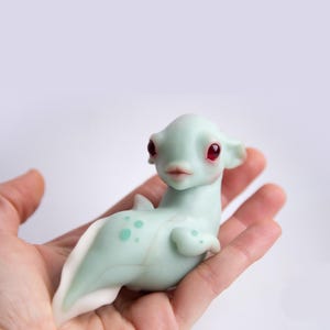 OOAK Baby Alien Fish Turquoise Figurine With Crystal Clear Epoxy Head with small fry inside